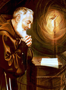 Padre Pio en prière